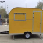 yellow food trailer