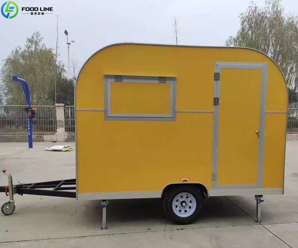 yellow food trailer