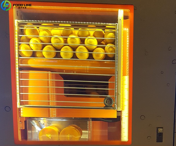 orange juice vending machine detail