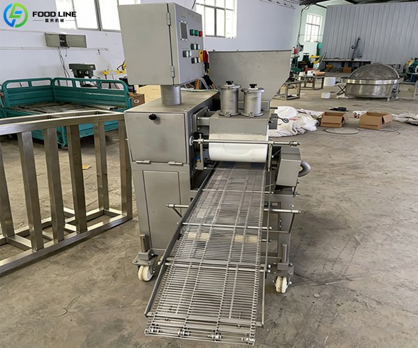 large scale meat patty forming device side