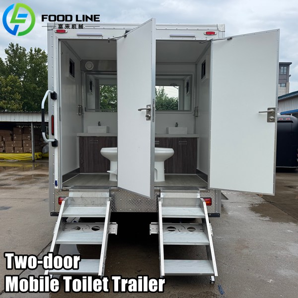 white two door mobile toilet trailer